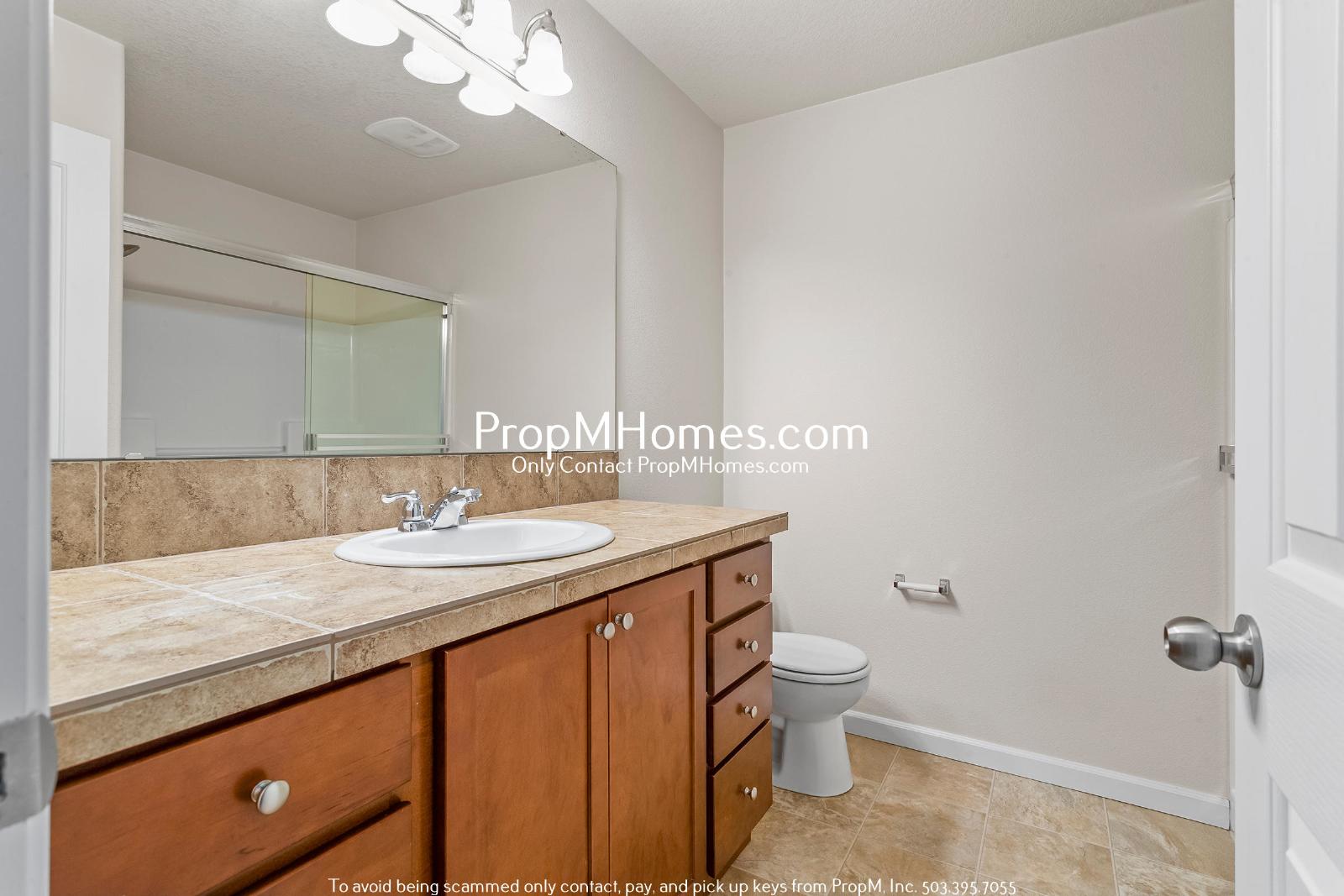 2-Bedroom Townhome in the Progress Ridge Area – Sleek Finishes, Private Balcony, and Garage! property image