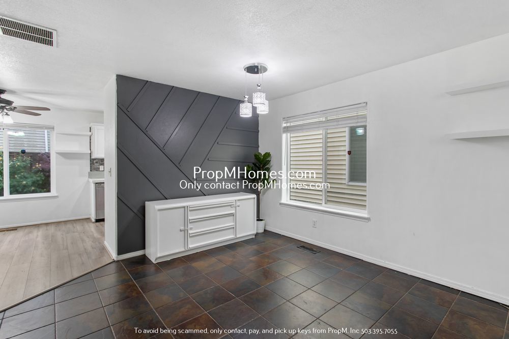 Modern Comforts: Attached Garage & Serene Backyard Deck! property image