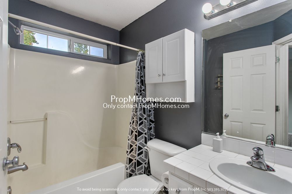 Modern Comforts: Attached Garage & Serene Backyard Deck! property image