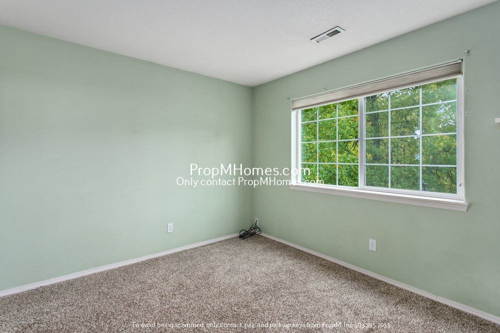 Modern Comforts: Attached Garage & Serene Backyard Deck! property image